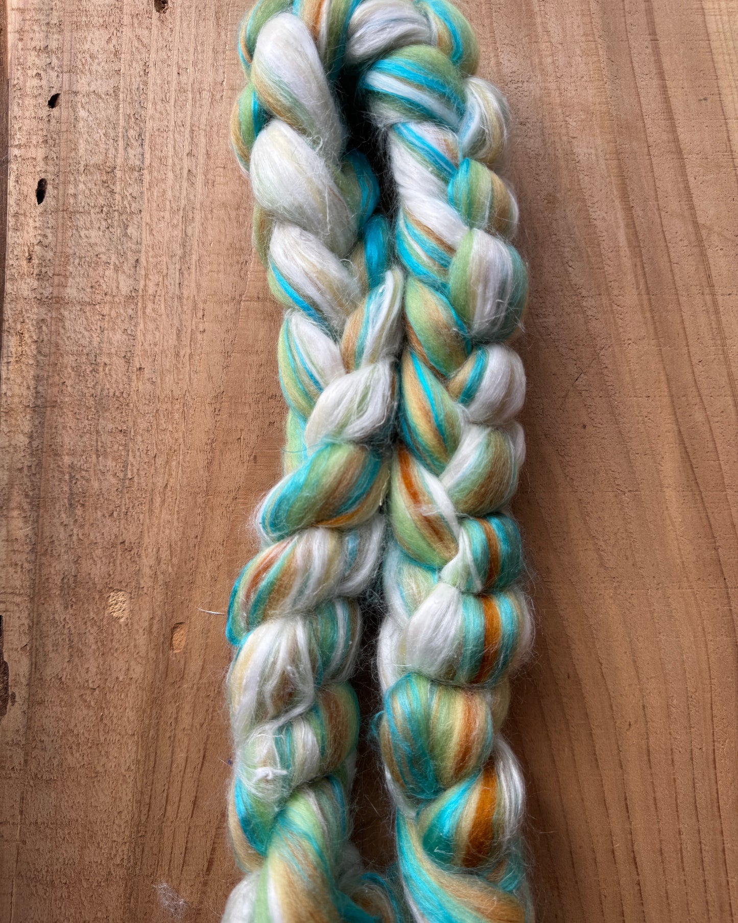 Seaglass Ritual – 4oz Spinning Fiber (75% Merino, 20% Pineapple, 5% Silk) Price: