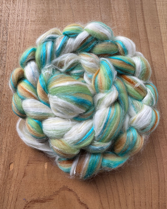 Seaglass Ritual – 4oz Spinning Fiber (75% Merino, 20% Pineapple, 5% Silk)  Price: