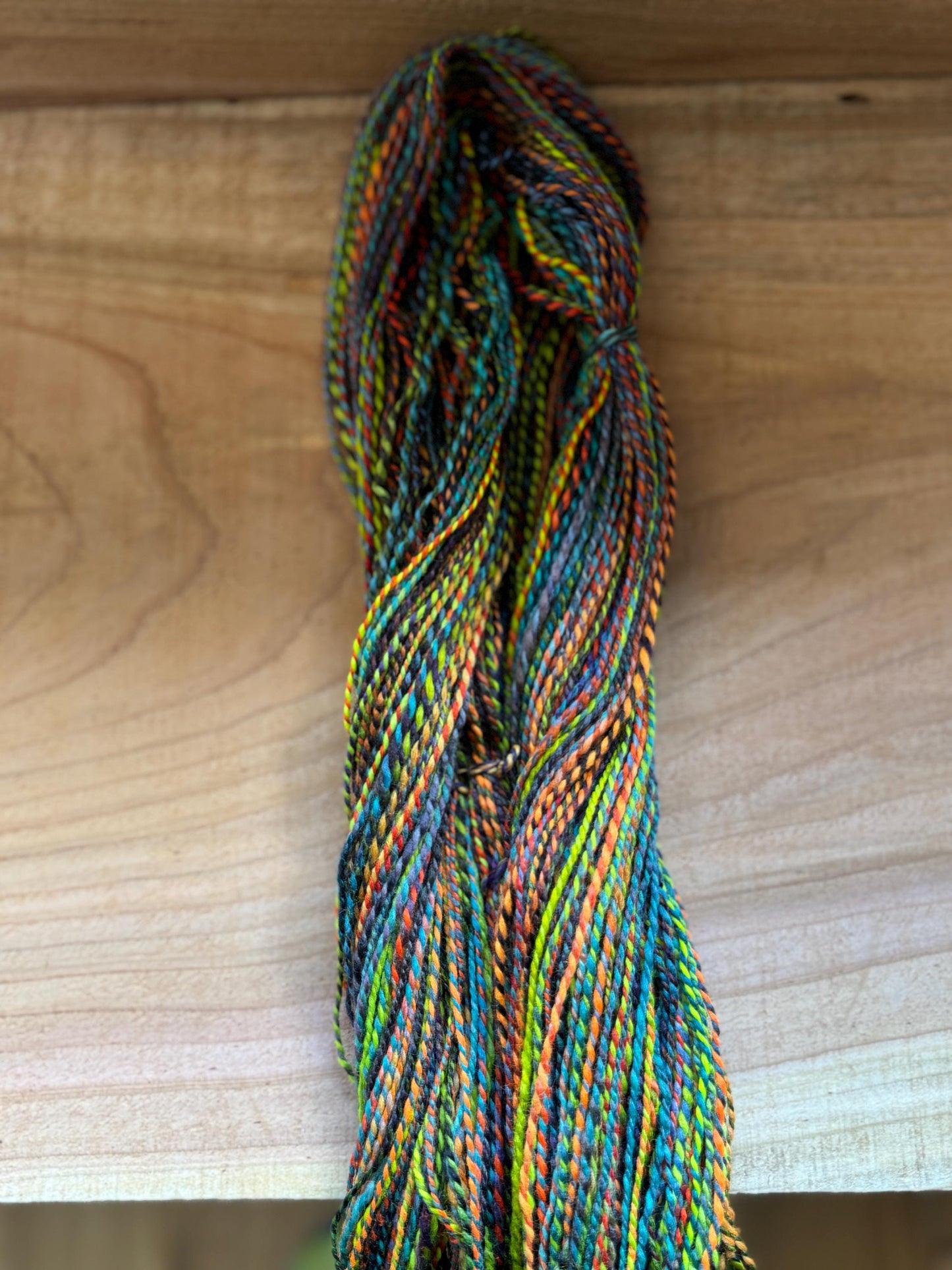 Handspun Yarn – Merino, Fingering Weight, 2-Ply – “Goblin Fire” – 120 Yards per Skein
