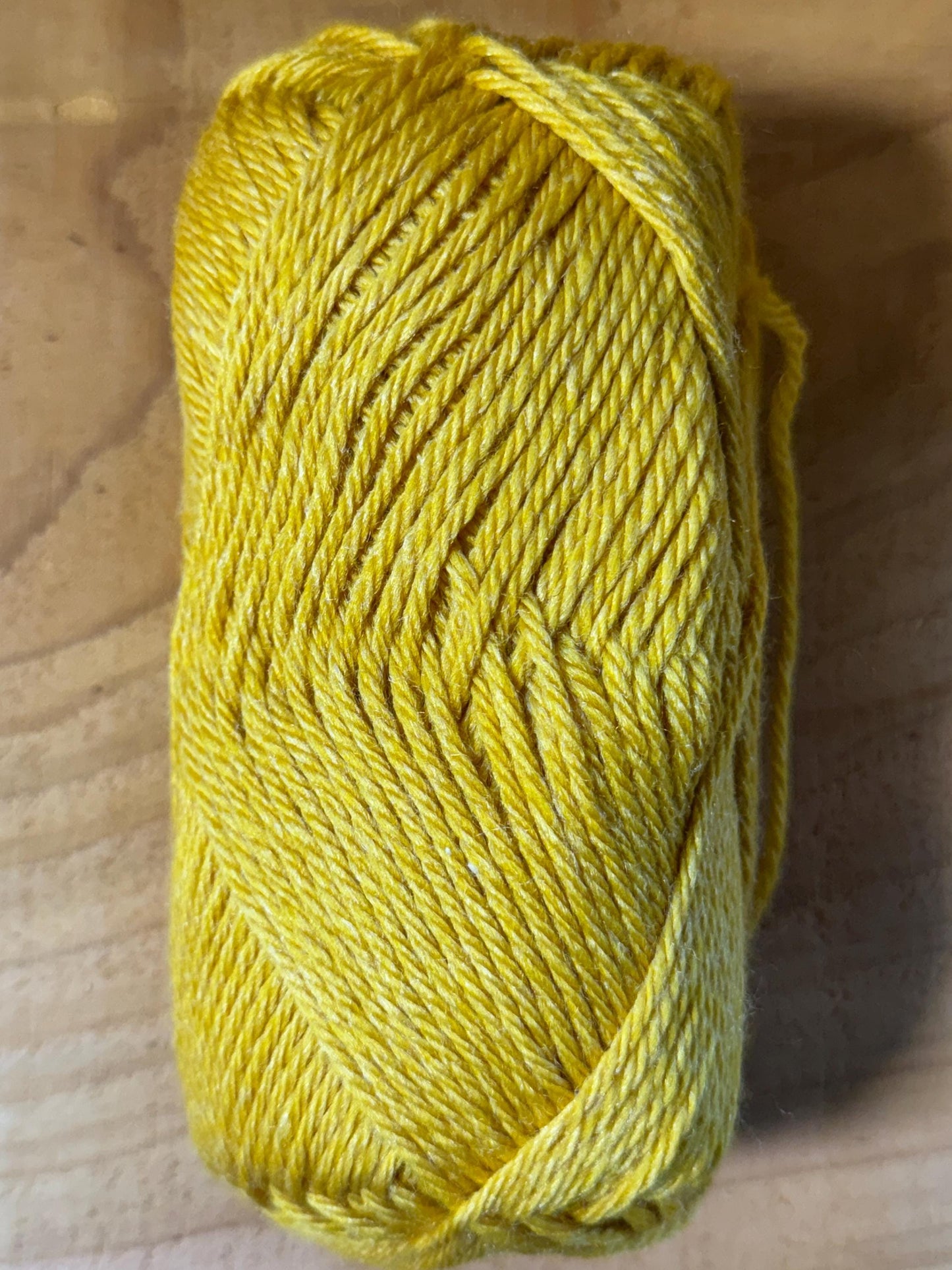 DK weight yarn. Merino Wool and Tussah Silk Blend. 50g. 120 yards. Hearthgold